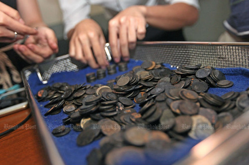 Из желудка черепахи извлекли 915 монет