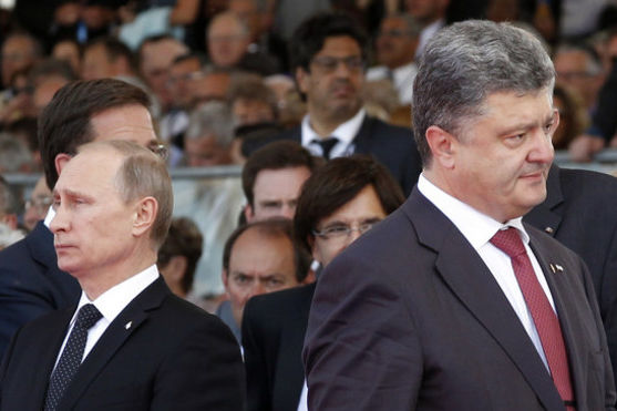 "Шутили, чтобы не ругаться". РосСМИ сообщили о тайном разговоре между Порошенко и Путиным