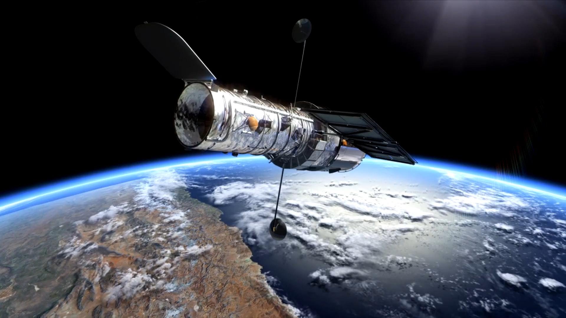 «Хаббл» посмотрел через гравитационную линзу в созвездии Кита